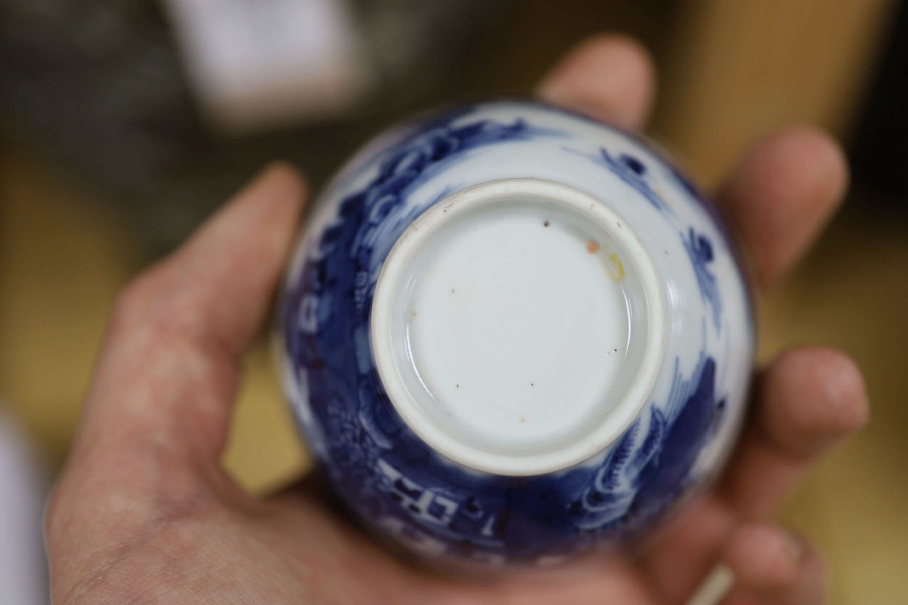 A Chinese blue and white bowl, diameter 15cm, a tea bowl and saucer, a crackleglaze shell dish and a celadon glazed stem cup